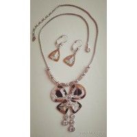 Набор серебристый , серьги и ожерелья 
